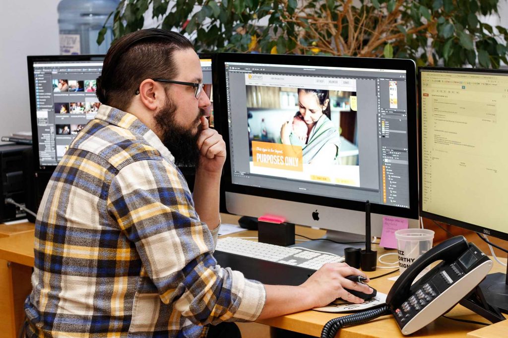 Jeff Koromi works on a custom website design at his Lform workstation.