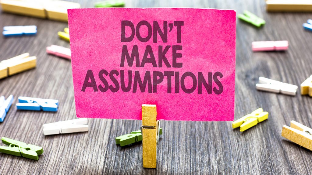 sign saying don't make assumptions